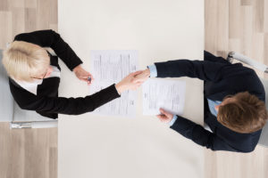 interviewer shaking hands